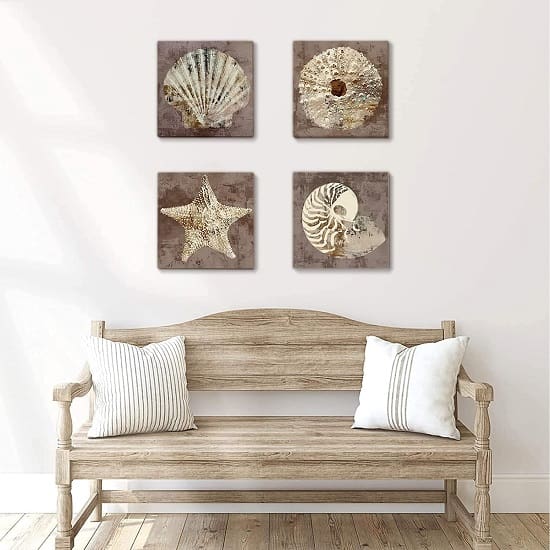0-Ivory-seashell-conch-starfish-sand-dollar-printed-against-vintage-brown-background 20 Seashell Wall Decor Ideas